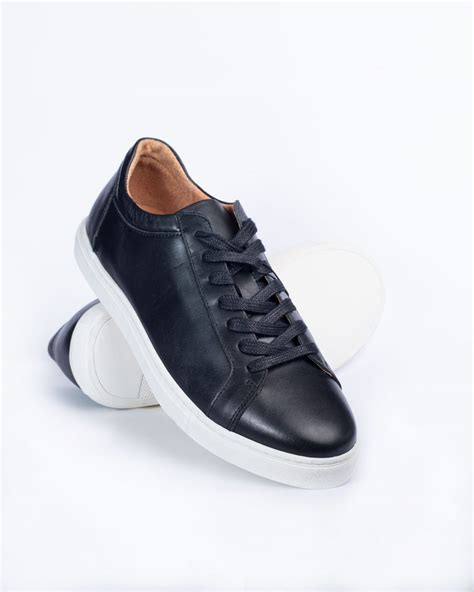 black sneakers white sole men.